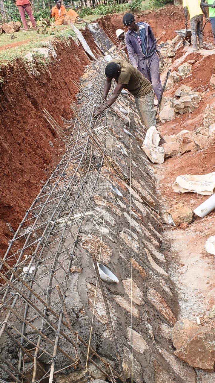 Retaining Walls & Civil Works — Aralam, Brim, Kapkoros & Kwirwot Health Centre IIIs (UGIFT Lot 1)